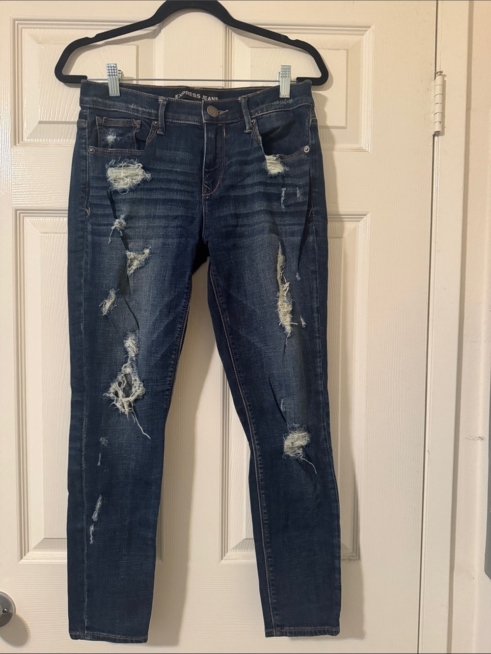 Express Womenβs Distressed Skinny Jeans in Dark Blue